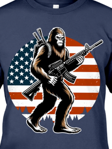 armed bigfoot in front of american flag 4th of july patriot teeshirt